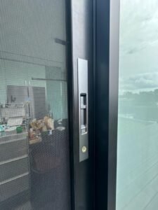 Retractable fly screen door handle at window dresser north shore