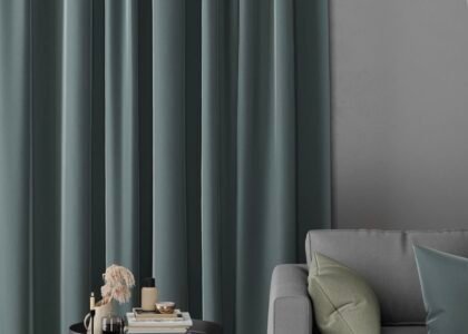 Dark green block-out curtains in a modern Auckland living room