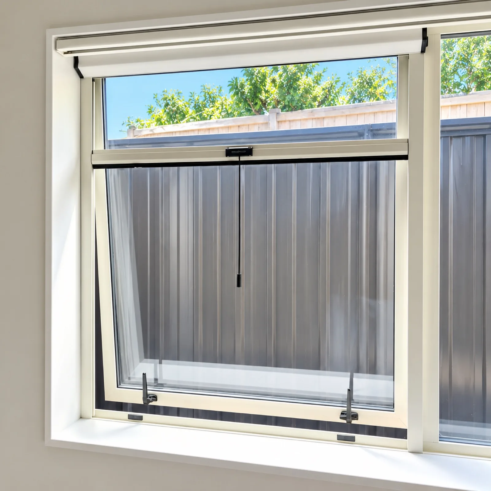 Retractable insect screen cassette on an awning window