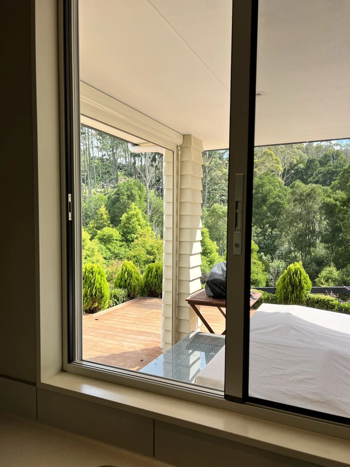 Sliding fly screen with a bush view